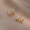 Kyrlune Gold Four-Claw Stud Earrings